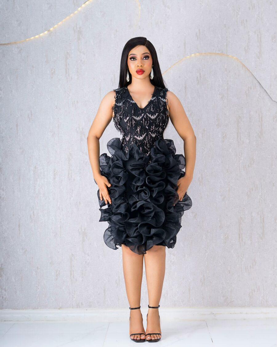 BLACK SHIMMER DRESS WITH MESH RUFFLES