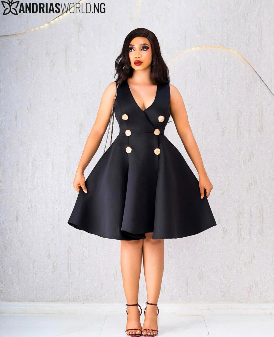 BLACK SCUBA DRESS WITH GOLD BUTTONS