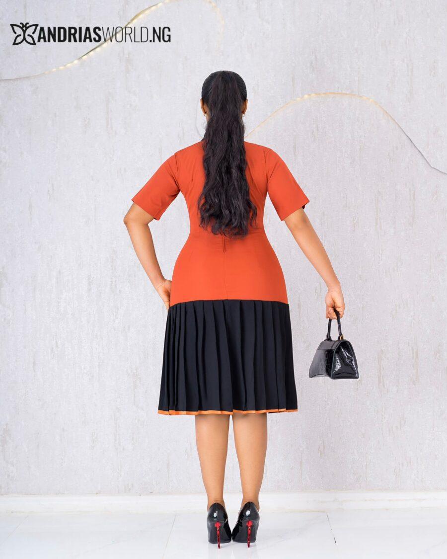 ORANGE AND BLACK PLEATED DRESS