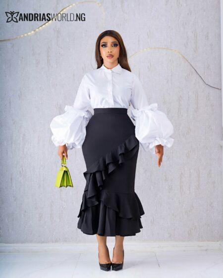 BLACK RUFFLE SKIRT AND WHITE PUFFY SLEEVE SHIRT