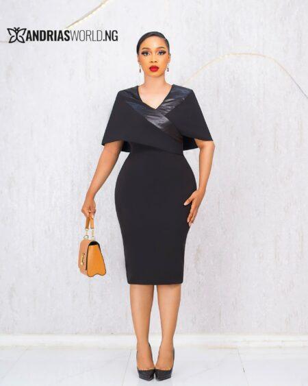 BLACK DRESS WITH CAPE