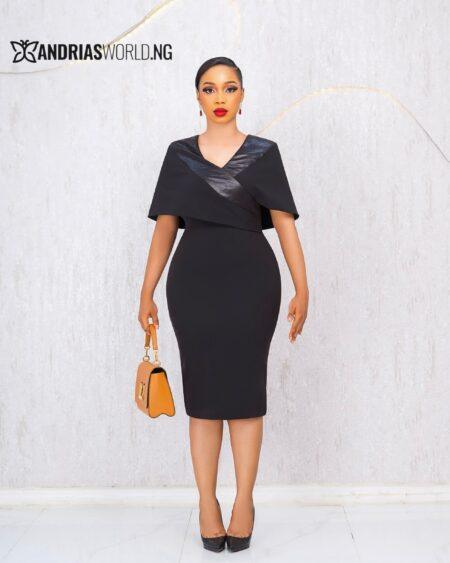 BLACK DRESS WITH CAPE