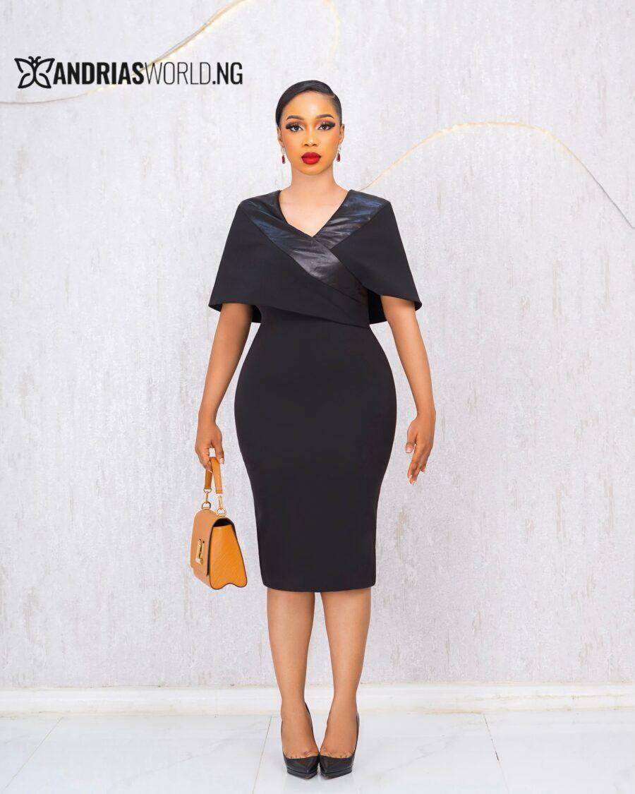 BLACK DRESS WITH CAPE