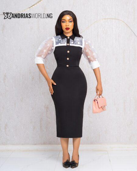 BLACK AND WHITE MIDI DRESS WITH ORGANZA SLEEVES