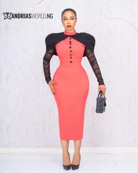 ORANGE AND BLACK CAPE DRESS WITH LACE SLEEVES