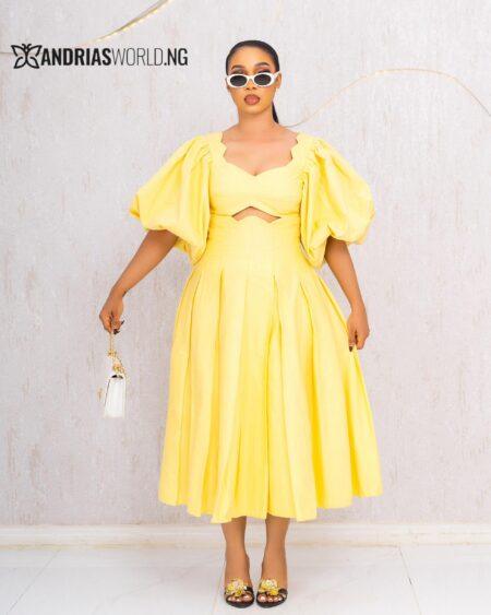YELLOW CUT-OUT FLARE DRESS