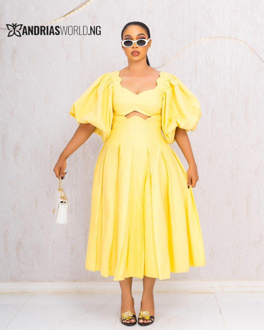 YELLOW CUT-OUT FLARE DRESS