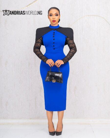BLUE AND BLACK CAPE DRESS WITH LACE SLEEVES