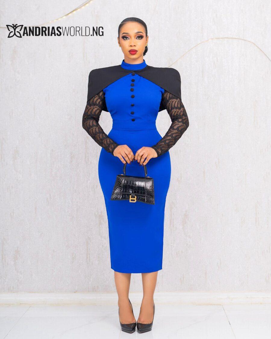 BLUE AND BLACK CAPE DRESS WITH LACE SLEEVES
