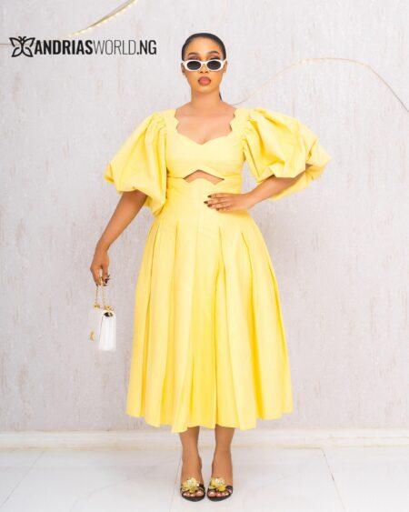 YELLOW CUT-OUT FLARE DRESS