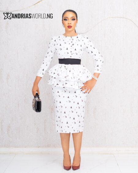 WHITE AND BLACK PATTERN PEPLUM TOP AND SKIRT SET