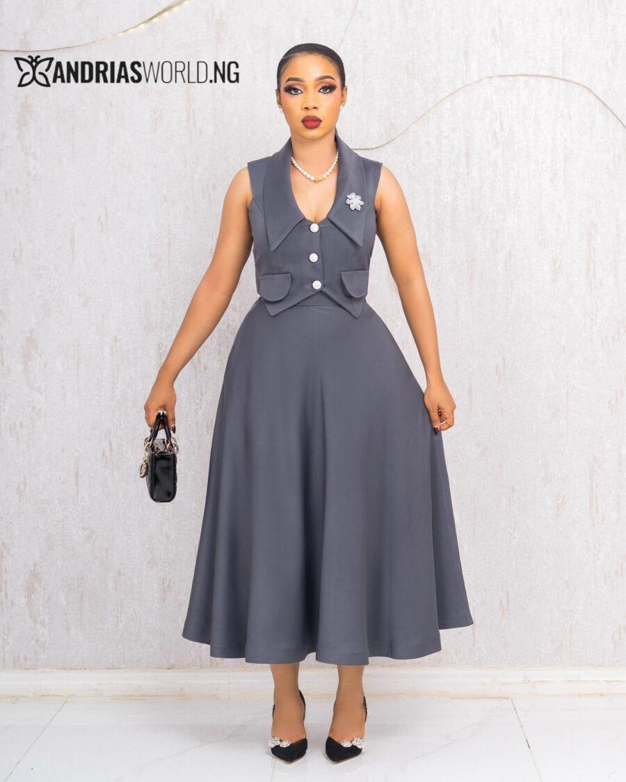 GREY SLEEVELESS TOP AND SKIRT SET WITH BROOCH