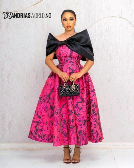 PINK AND BLACK BOW-CAPE SKATER DRESS