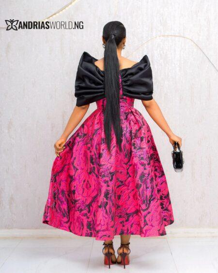 PINK AND BLACK BOW-CAPE SKATER DRESS