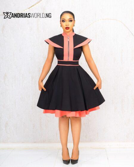 BLACK AND PEACH SKATER DRESS WITH CAPE
