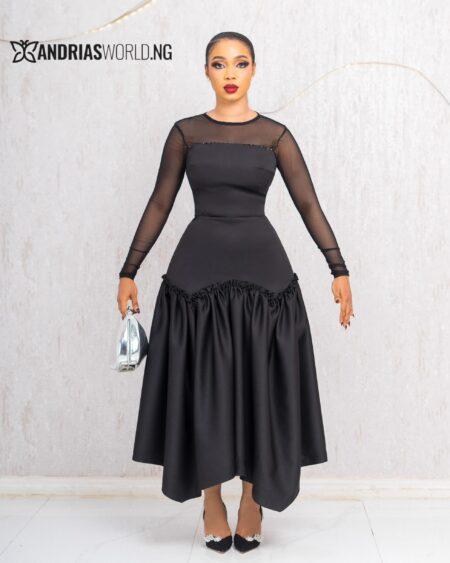 BLACK RUFFLE DRESS WITH MESH SLEEVES
