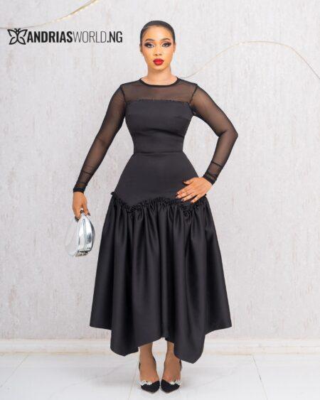 BLACK RUFFLE DRESS WITH MESH SLEEVES