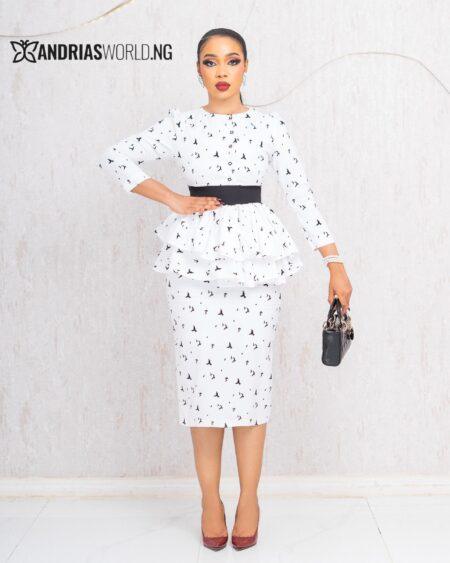 WHITE AND BLACK PATTERN PEPLUM TOP AND SKIRT SET