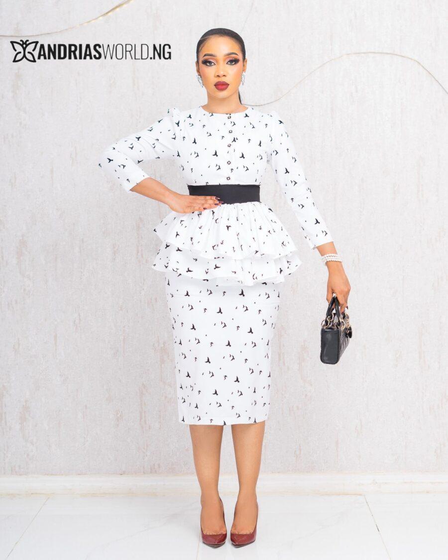WHITE AND BLACK PATTERN PEPLUM TOP AND SKIRT SET