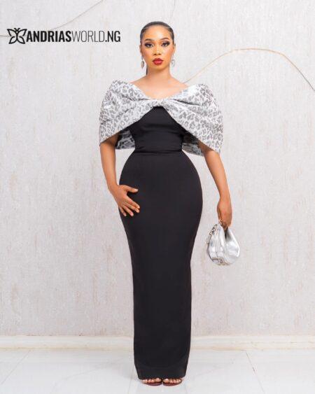 BLACK AND WHITE THREE PIECE SKIRT SUIT