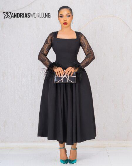 BLACK SKATER DRESS WITH LACE SLEEVES