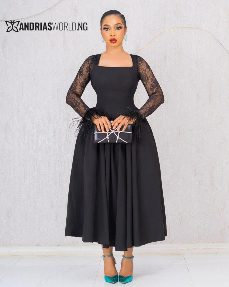 BLACK SKATER DRESS WITH LACE SLEEVES