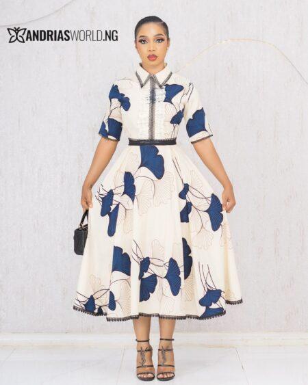 CREAM AND BLUE FLORAL FLARE DRESS