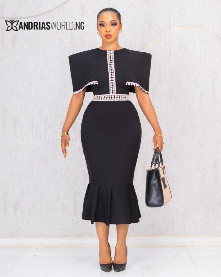 BLACK AND WHITE CAPE DRESS