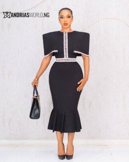 BLACK AND WHITE CAPE DRESS