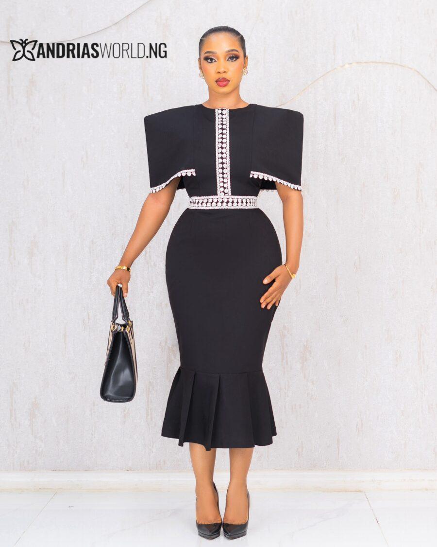BLACK AND WHITE CAPE DRESS