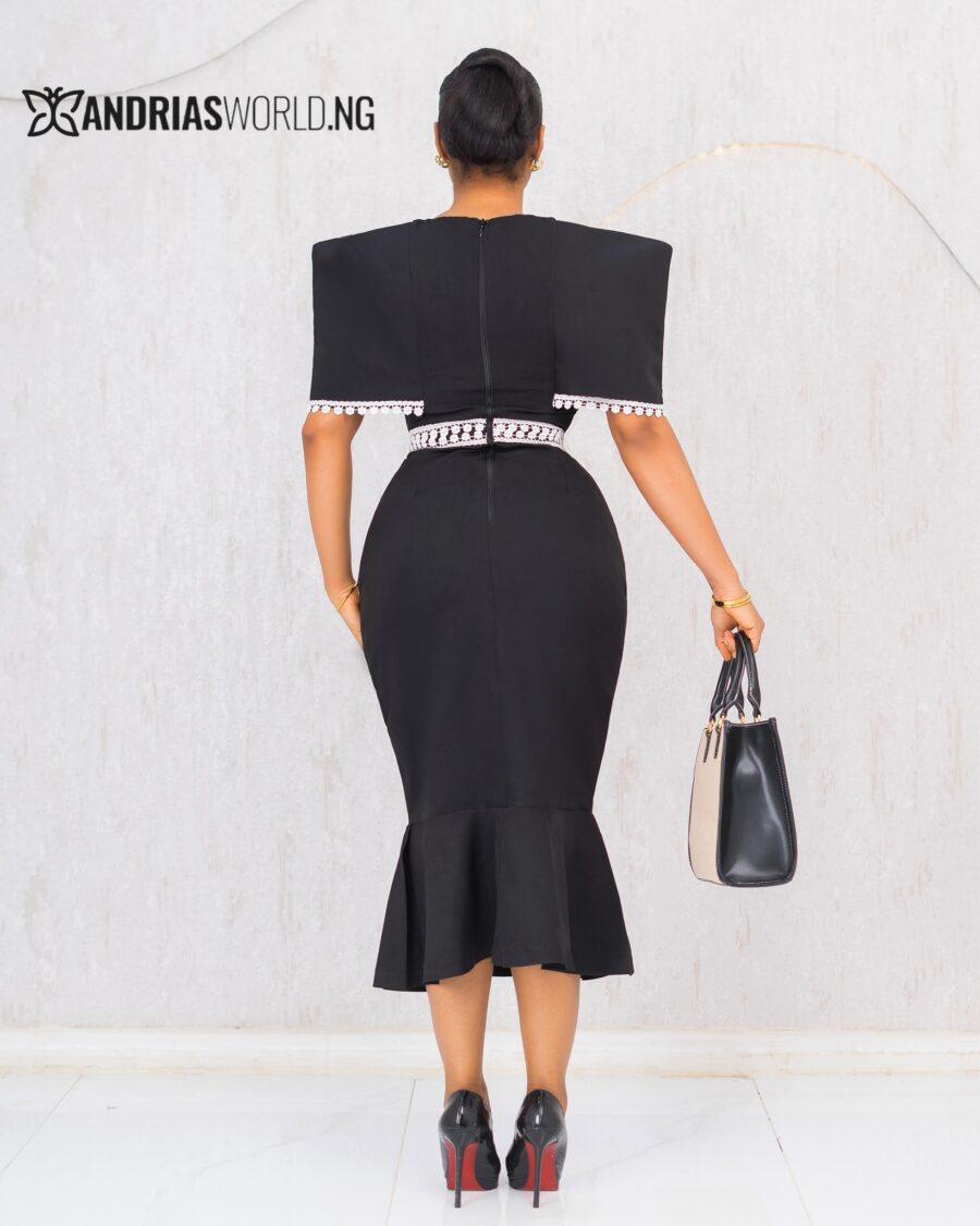 BLACK AND WHITE CAPE DRESS
