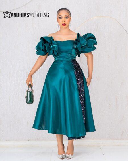 GREEN MIKADO SKATER DRESS WITH SEQUIN DETAIL