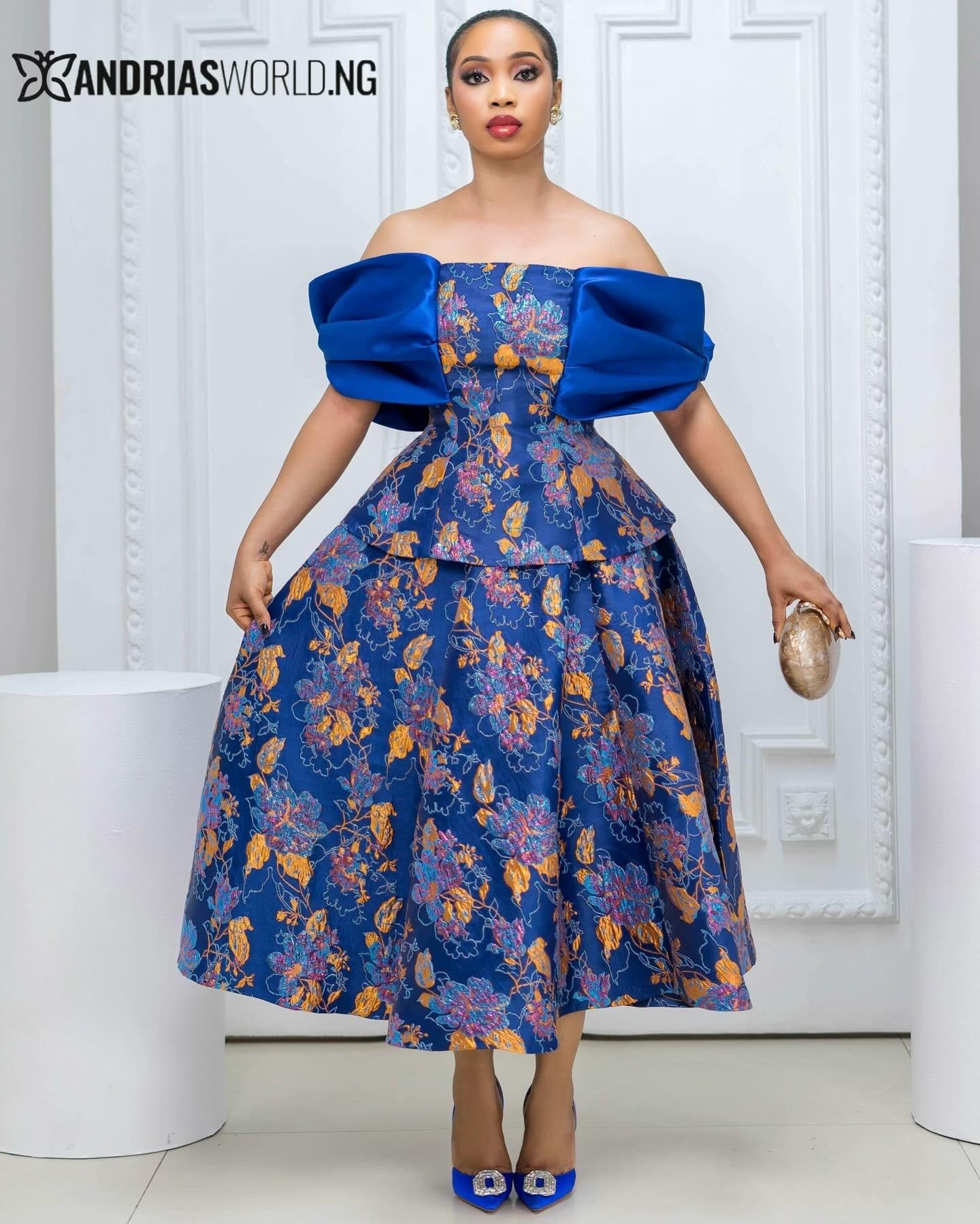 Blue Brocade Skirt set with Structured Off-Shoulder Sleeve Blue Brocade Skirt set with Structured Off-Shoulder Sleeve