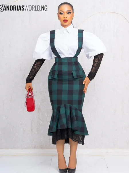 Green check pinafore dress with white puffy [sleeves]