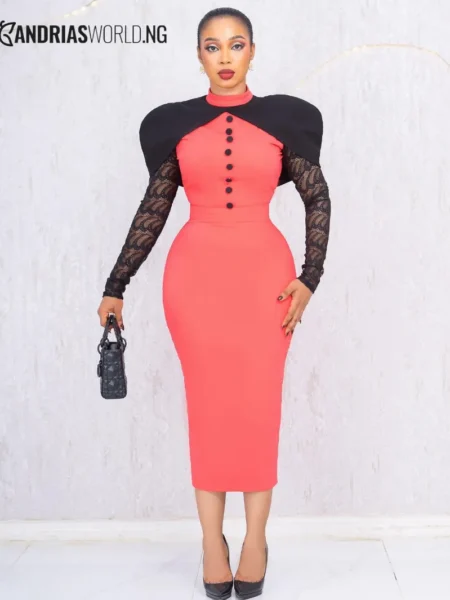 Orange pink and black cape dress with lace sleeves