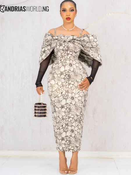 Cream and black damask cape dress with lace sleeves